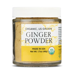 Jar of NUF Organic Ginger Powder with a white label on a white background