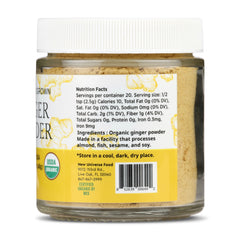 Glass jar of NUF Organic Ginger Powder with label on a white background