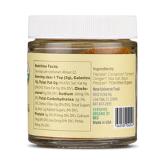 Jar of Golden Latte Mix with nutrition facts and ingredients label on a white background