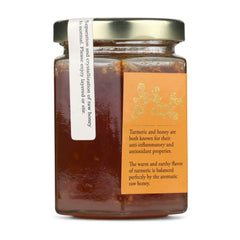 Jar of NUF Turmeric Infused honey with a label on a white background