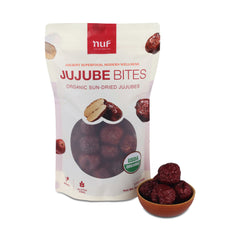 Packaging of NUF Jujube Bites with a bowl of jujubes on a white background