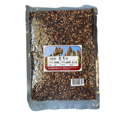 Packaged black rice with a label on a white background