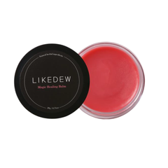 Pink balm in a black container with 'LIKEDEW' branding on a white background