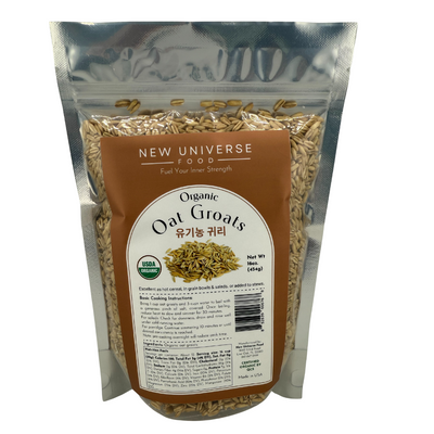 Package of New Universe Food Organic Oat Groats on a white background