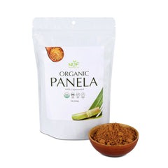 NUF Organic Paneela packaging with a bowl of paneer on a white background