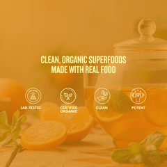 Turmeric, mandarin, ginger tea in a glass jar on a blurred background, featuring certification icons and text about clean, organic superfoods.