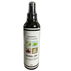 Bottle of Wonil Jin  Hair tonic on a white background