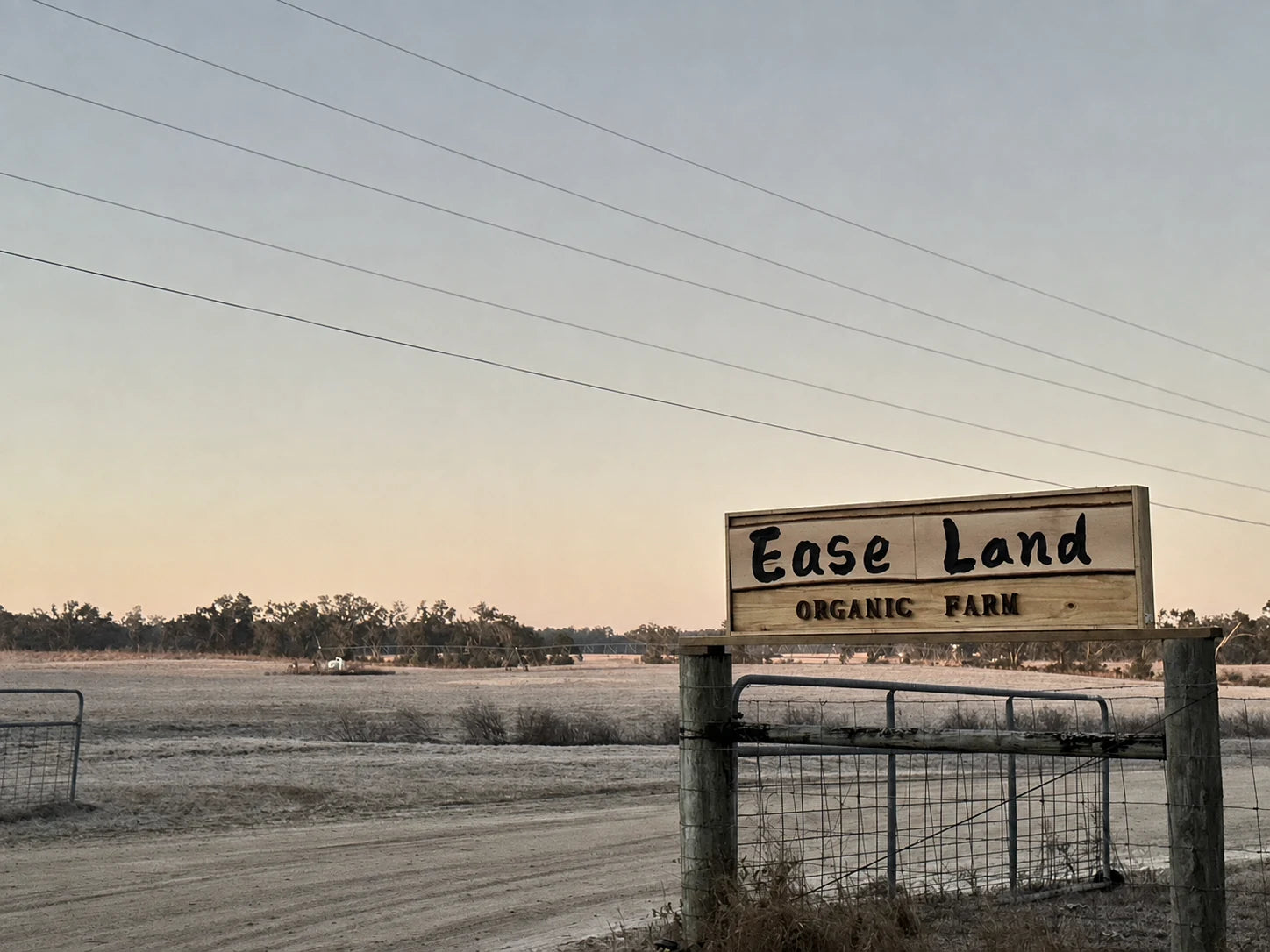 Ease Land Organic Farm entrance sign in Live Oak, Florida